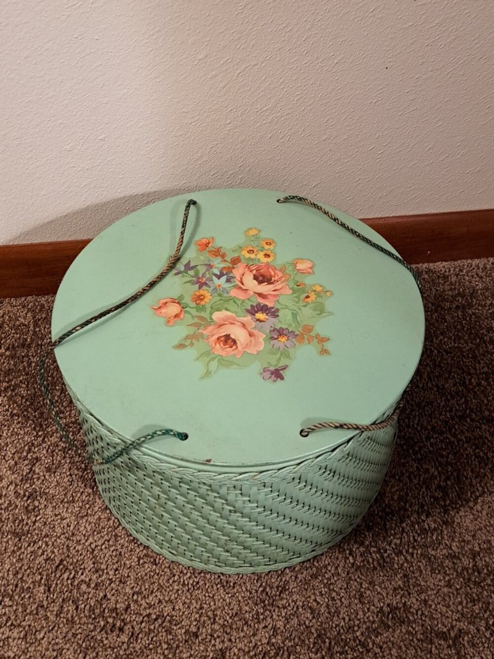 Vintage Princess round sage-green woven wicker sewing basket with floral detail